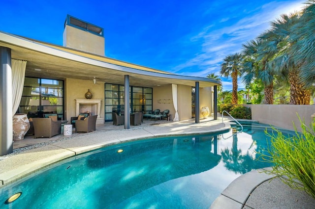 view of swimming pool with a patio area and outdoor lounge area