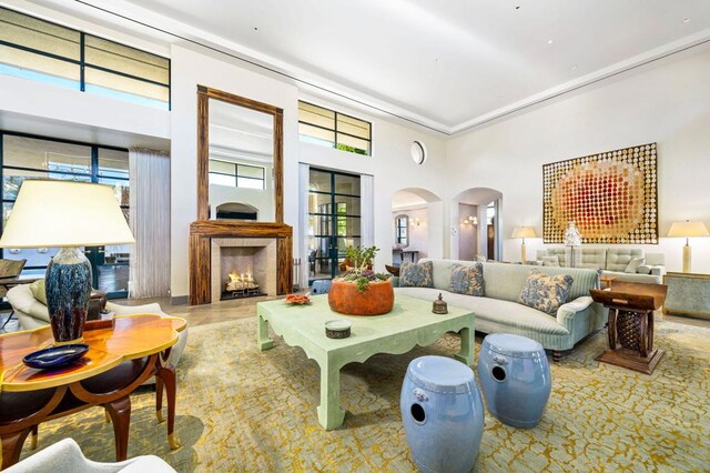 living room with a towering ceiling