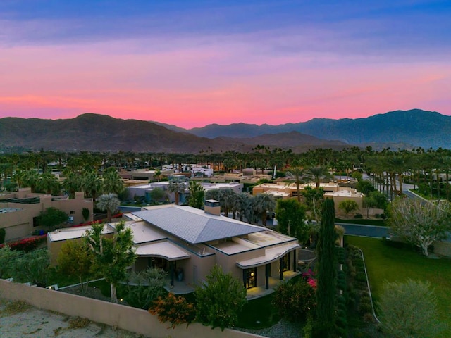 aerial view at dusk with a mountain view