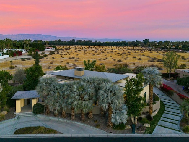 aerial view at dusk with a mountain view