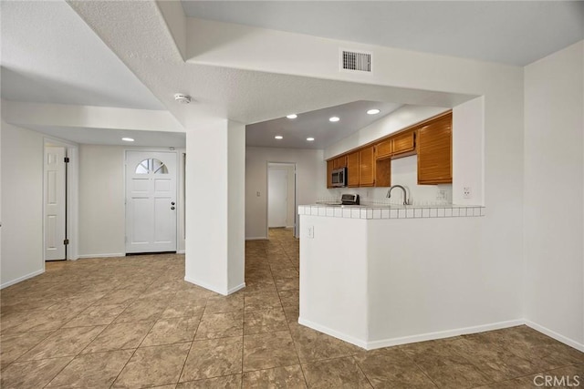 kitchen with tile countertops