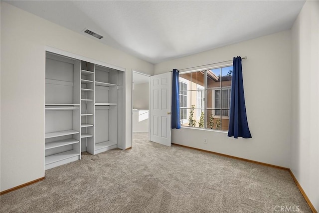 unfurnished bedroom featuring carpet