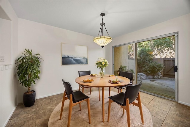 view of tiled dining space