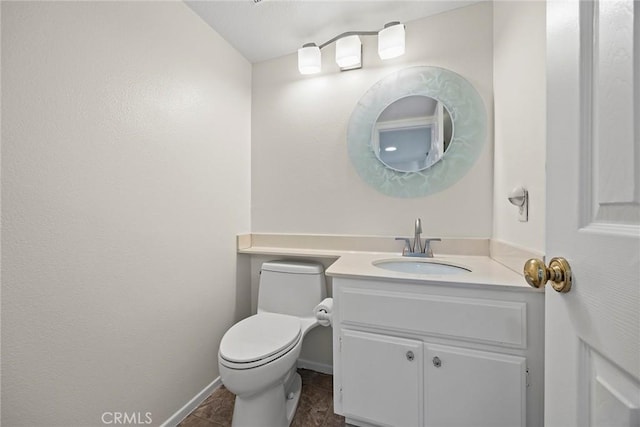 bathroom with toilet, tile patterned flooring, lofted ceiling, and vanity