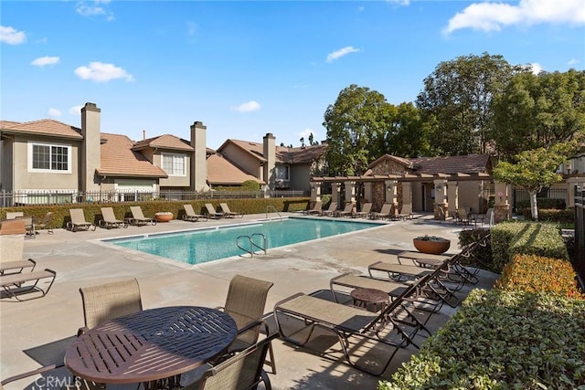 view of swimming pool featuring a patio area