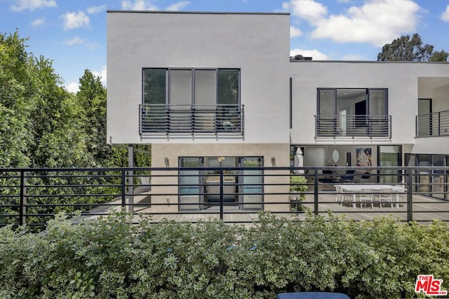 exterior space with a balcony