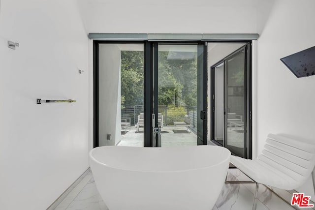 interior space with a tub to relax in