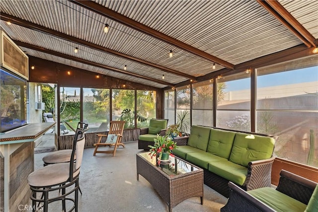 sunroom with vaulted ceiling