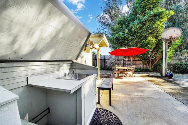 view of patio / terrace featuring a wet bar