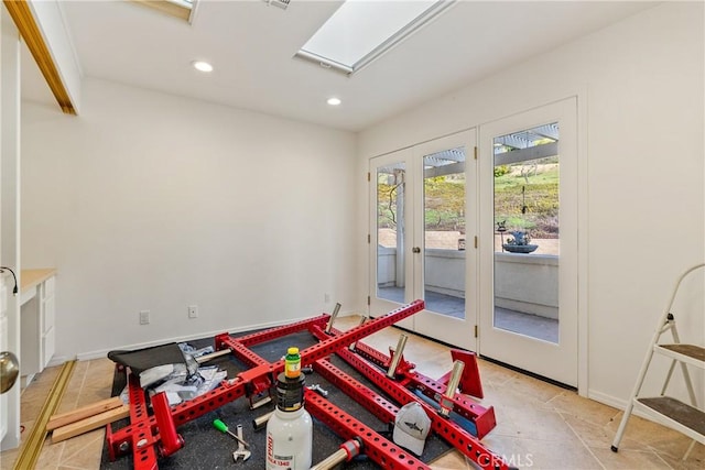 playroom with a skylight, french doors, baseboards, and recessed lighting