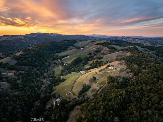 aerial view at dusk with a mountain view