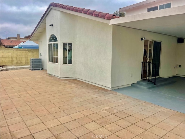 view of patio with cooling unit