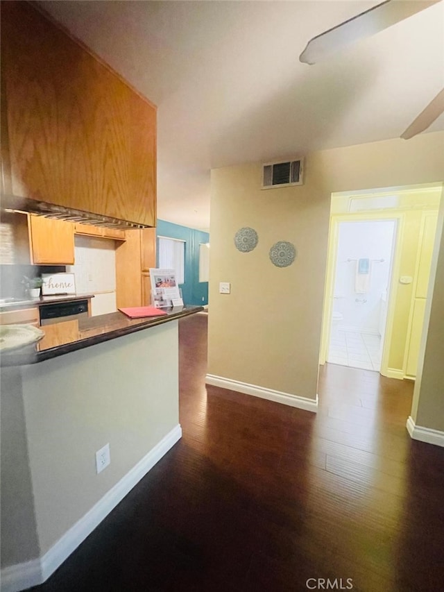 kitchen with dark hardwood / wood-style floors