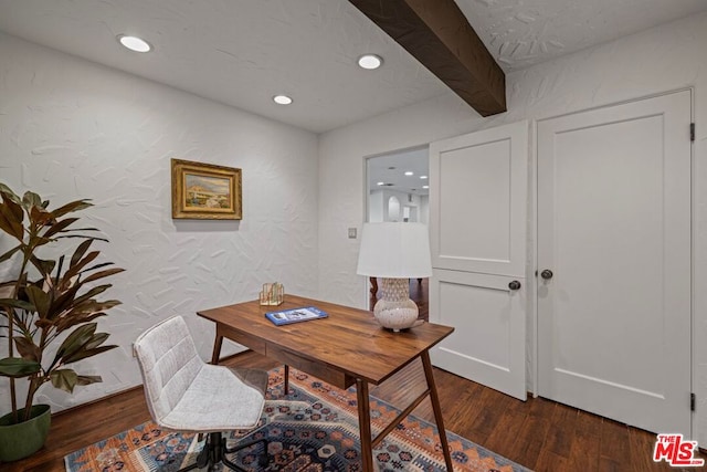 home office featuring dark hardwood / wood-style floors and beamed ceiling