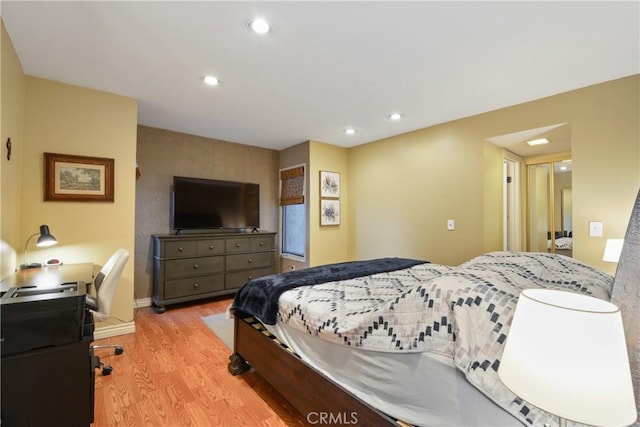 bedroom with light hardwood / wood-style floors