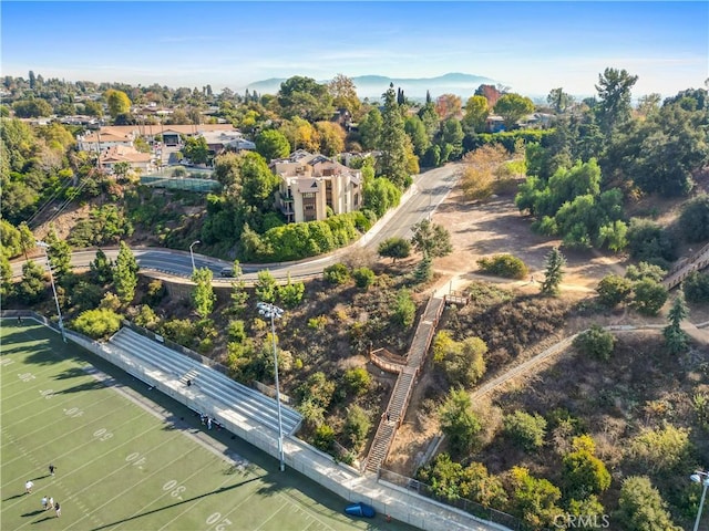 drone / aerial view featuring a mountain view