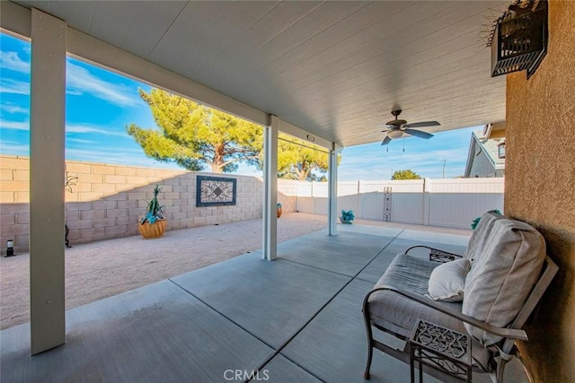 view of patio featuring ceiling fan