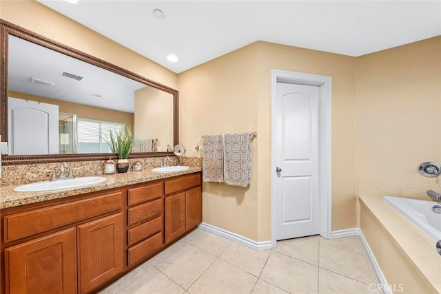 bathroom with vanity, independent shower and bath, and tile patterned flooring