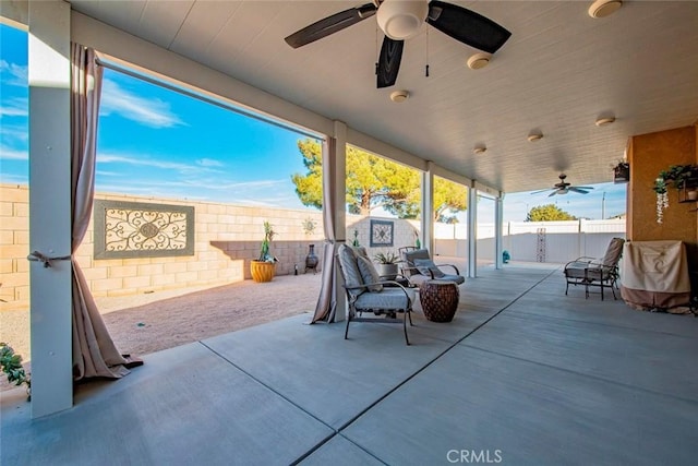 view of patio with ceiling fan