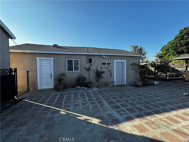 rear view of property with a patio