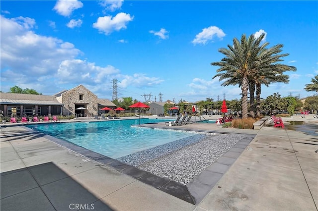 view of pool featuring a patio area