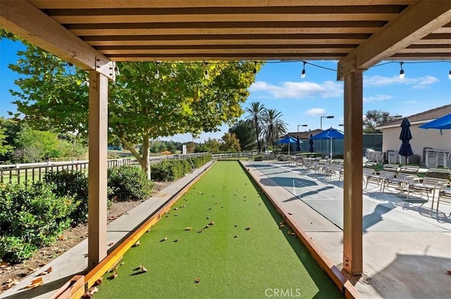 view of property's community with fence