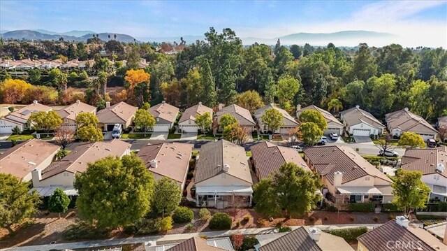 aerial view with a residential view and a mountain view