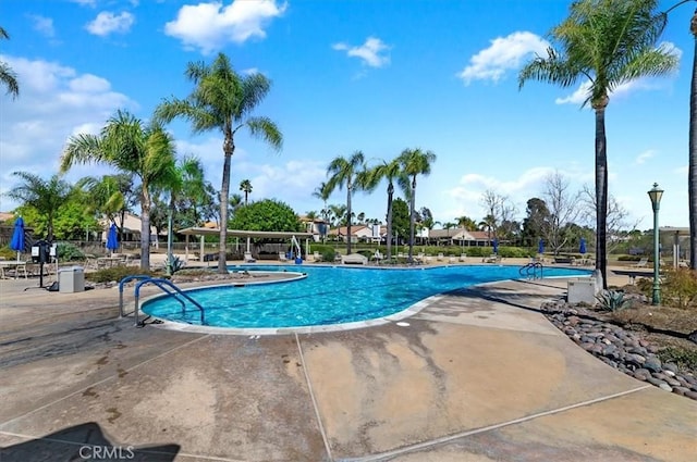 pool with a patio