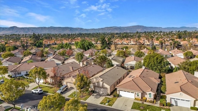 aerial view with a mountain view and a residential view