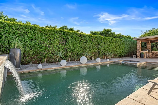 view of pool featuring a patio area