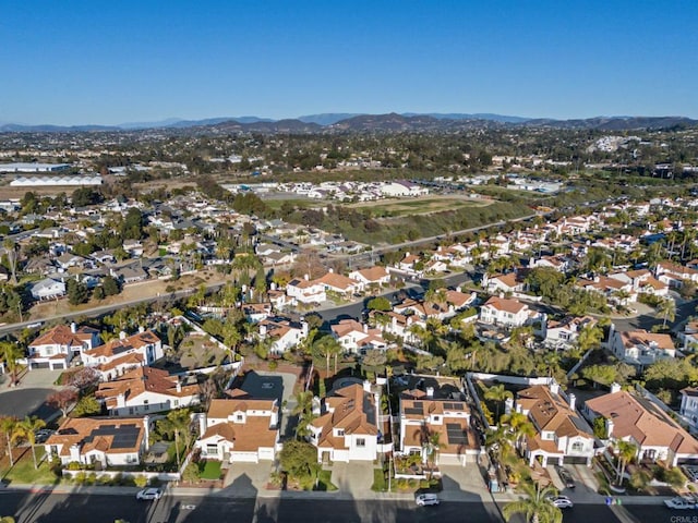 drone / aerial view featuring a mountain view