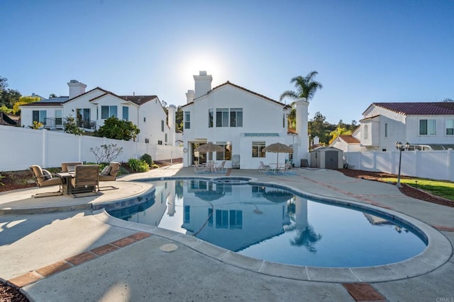 view of swimming pool with a patio area