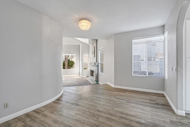 interior space with a chandelier and light wood-type flooring