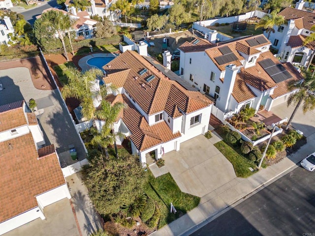 birds eye view of property with a residential view