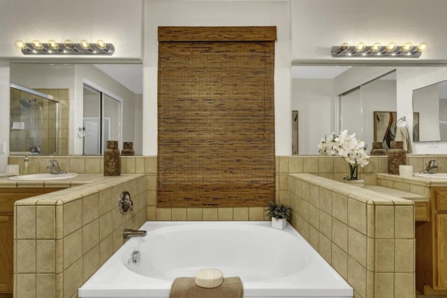 bathroom with vanity and a bathtub