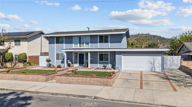 front of property featuring a garage