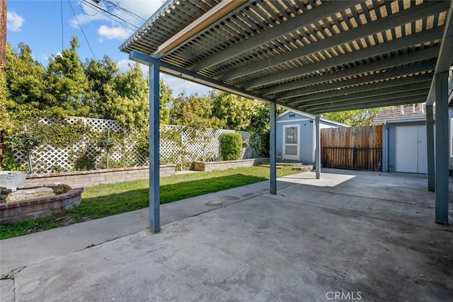 view of patio / terrace with a storage unit