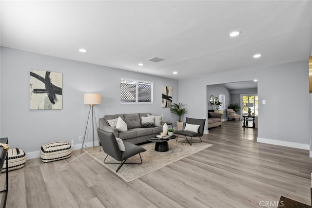 living room with light wood-type flooring