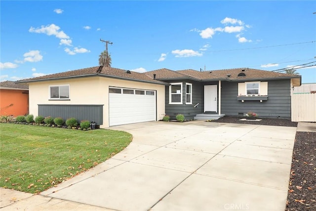 ranch-style home with a front yard and a garage