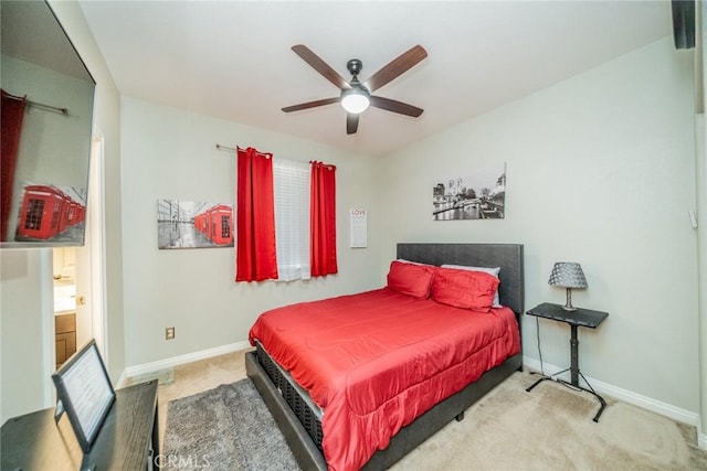 bedroom with ceiling fan and carpet floors