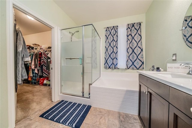 bathroom with vanity, tile patterned floors, and independent shower and bath