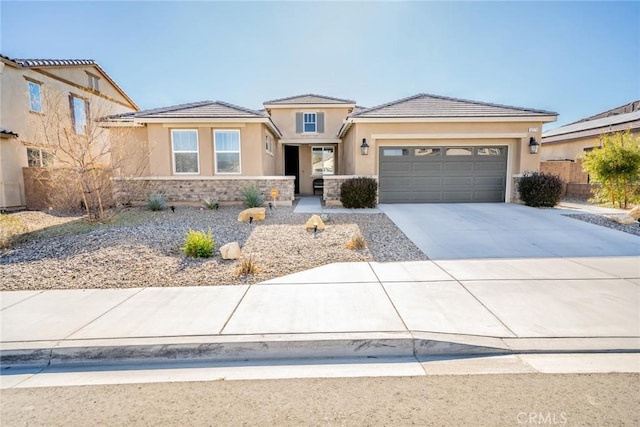 view of front of property with a garage