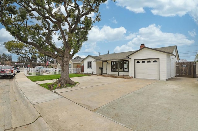 ranch-style house featuring a garage