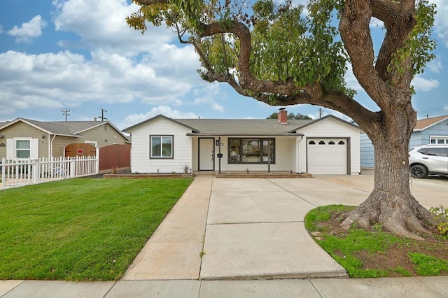 ranch-style home with a garage and a front lawn