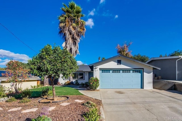 ranch-style home with a garage