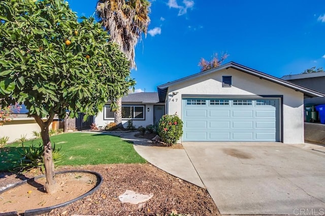 single story home with a front lawn and a garage