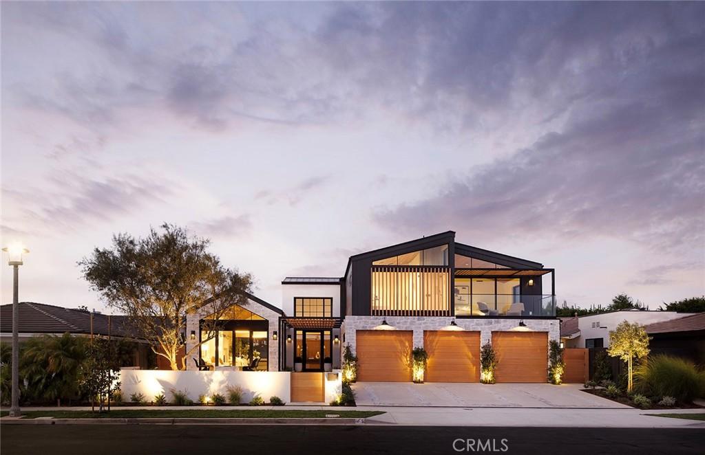 view of front of house featuring a balcony