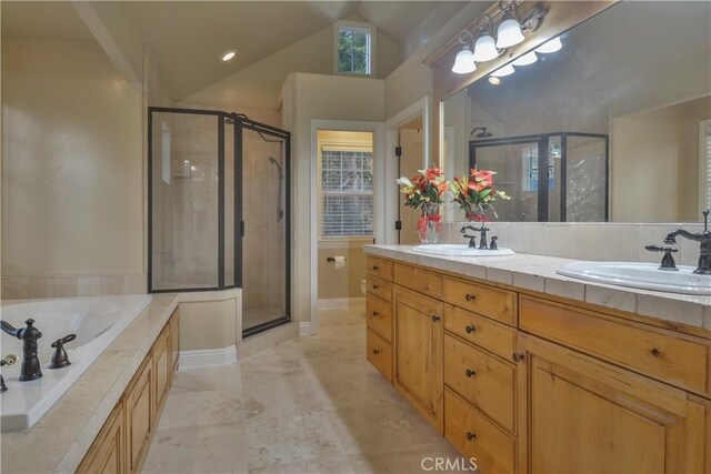 173 Grizzly Rd, Lake Arrowhead, CA 92352 - bathroom with a stall shower, a garden tub, double vanity, and lofted ceiling