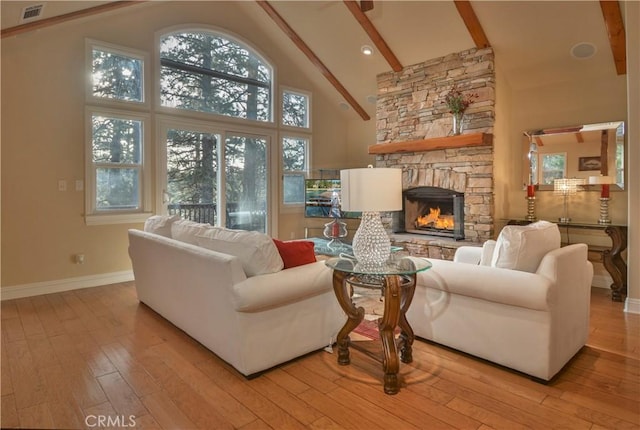 173 Grizzly Rd, Lake Arrowhead, CA 92352 - living room featuring high vaulted ceiling, a fireplace, hardwood / wood-style floors, and beam ceiling