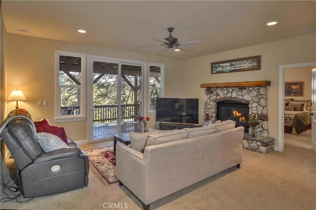 173 Grizzly Rd, Lake Arrowhead, CA 92352 - living area with a ceiling fan, light colored carpet, a stone fireplace, and recessed lighting